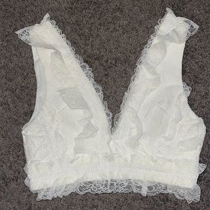 Cutest Lace Tank top size small. Never worn brand new with attached tag.